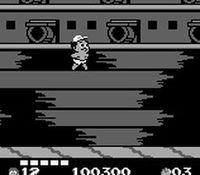 une photo d'Ã©cran de Adventure Island 2 - Aliens in Paradise sur Nintendo Game Boy